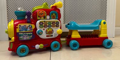 Fisher price ride on train and activity Center