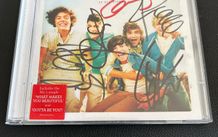 One Direction autographed cd