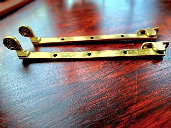Vintage brass window stays