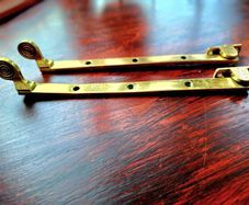 Vintage brass window stays