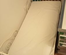 Single bed with a mattress