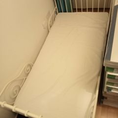 Single bed with a mattress