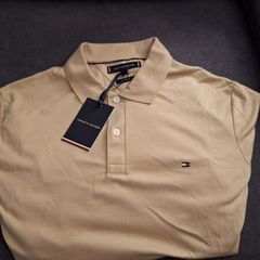 3 Tommy Hilfiger Tshirts (slightly) damaged, with tags never worn.