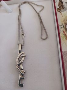 silver chain and pendant