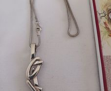 silver chain and pendant