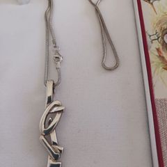 silver chain and pendant