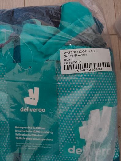 Deliveroo Full Cycle Kit never used fully in original packing never opened. It consists of a proper insulated branded delivery bag, fully waterproof raincoat, Jacket size L