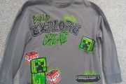 boy's long sleeves top. Age7/8
