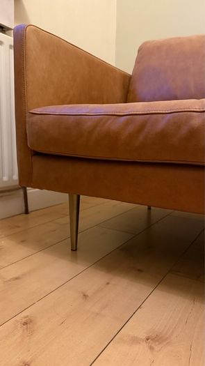 Three seater contemporary tan leather sofa