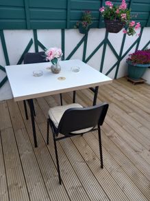 garden table and chairs with cushions