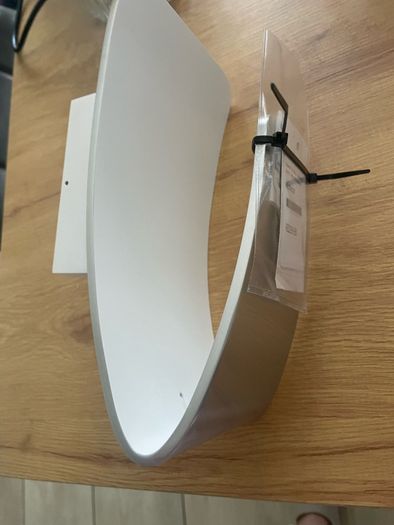 Jenkins 1lt Wall fixture in a white and polished aluminium finish