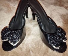 Heeled sandals.