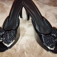 Heeled sandals.