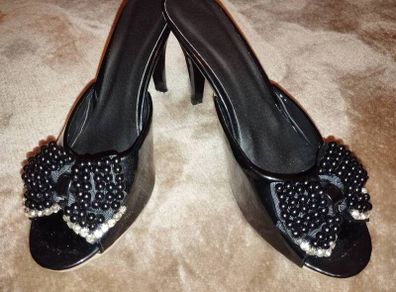 Heeled sandals.