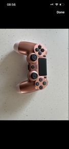 Rose gold ps4 controller ( mint condition and genuine )