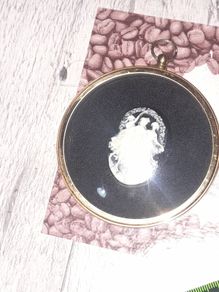 Peter Bates Three Graces Cameo it is housed in a 3 inch diameter Brass Frame with a Convex Glass Cover. in nice condition postage available or collection