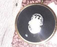 Peter Bates Three Graces Cameo it is housed in a 3 inch diameter Brass Frame with a Convex Glass Cover. in nice condition postage available or collection