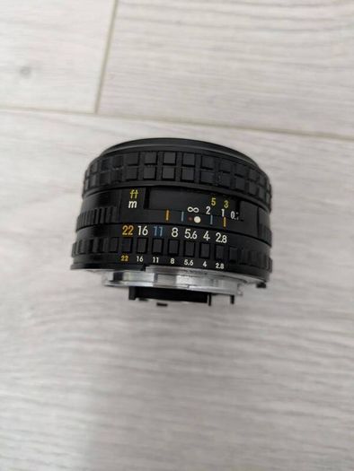 Nikon Series E 28mm f/2.8 manual focus wide-angle prime lenses.