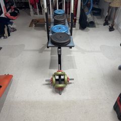 weight bench barbell and cast iron weights
