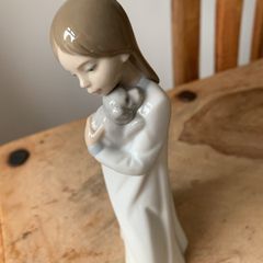 Beautiful Figure Holding Puppy