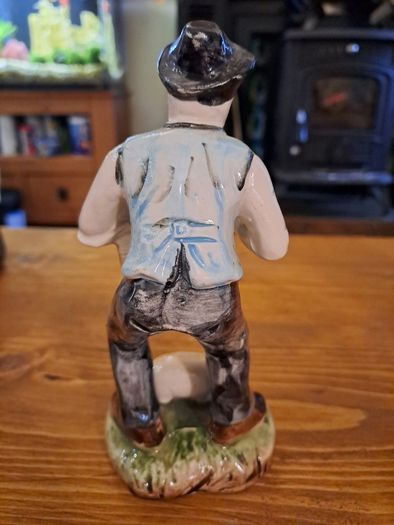 Vintage farmer figurine