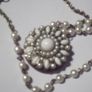 a vintage locket  penden on a long chain with pearls and white stones Image 5