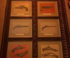 8 Vintage framed Rare Flintlock Pistols Prints