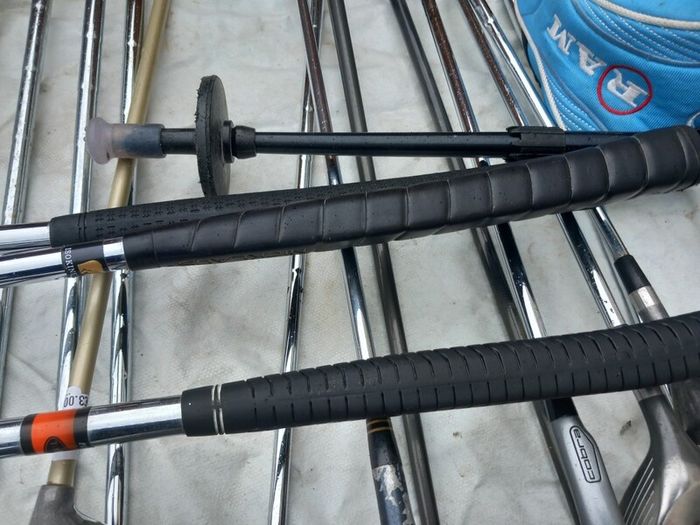 A selection of golf clubs and bags. NOT SELLING SEPARATE