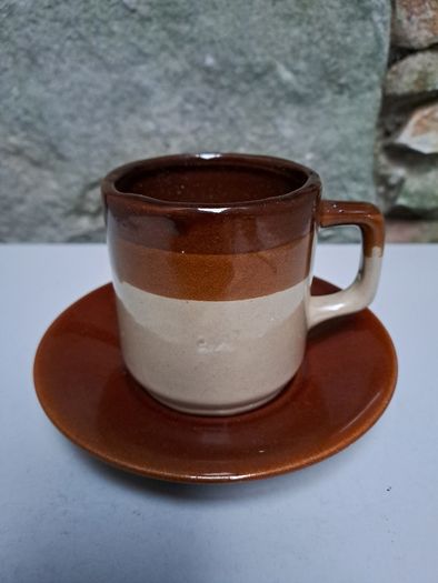 Dark and light brown cup and saucer