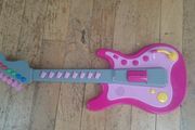 Childs musical guitar