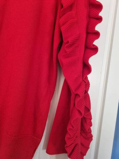 Red jumper Frill detail