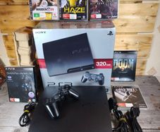 Playstation 3 slim 320GB boxed with 6 games ,controller all cables