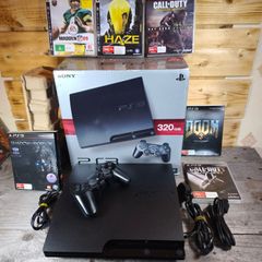 Playstation 3 slim 320GB boxed with 6 games ,controller all cables
