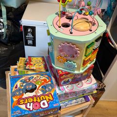Kids table and chairs and mix of toys and books all have to go together