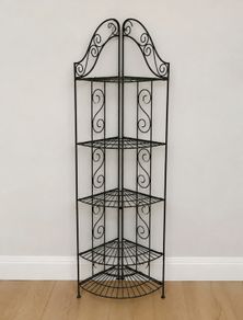 Black metal corner shelving unit