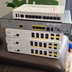 Cisco router 800, switches x 3 2960s 8 port, 1 fortinet firewall (without power cable)