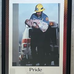 Framed Motivational Pride Photo showing ambulance crew with baby.