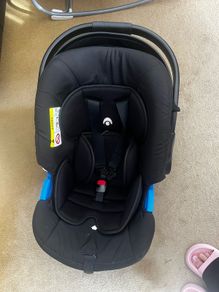 Next to me and car seat