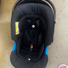 Next to me and car seat