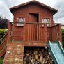 Playhouse with swings and slide Image 6