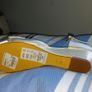 Brand new, never worn ivory satin wedge shoe with satin bow detail. Image 3