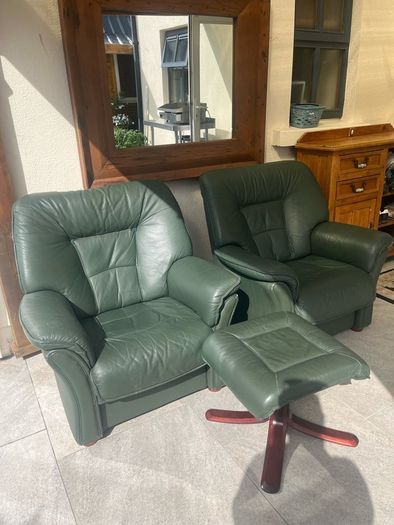 green leather armchairs