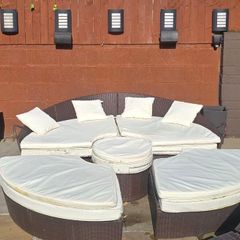 Patio day bed with cushions