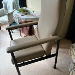 Adjustable high backed chair for an elderly person