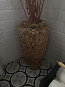 Rattan basket and willow stems