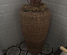 Rattan basket and willow stems
