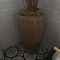 Rattan basket and willow stems
