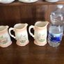 A set of 3 Large Peach Floral porcelain Graduating jugs Image 2