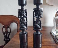 2 hand carved ebony candlesticks