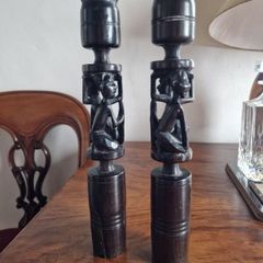 2 hand carved ebony candlesticks